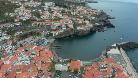 aerial shot of câmara de lobos bay fisherman village in madeira, portugal