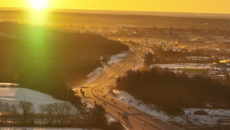 aerial misty morning commute timelapse with sun glow