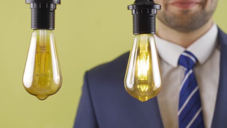 businessman prefers one of the idea lamps.