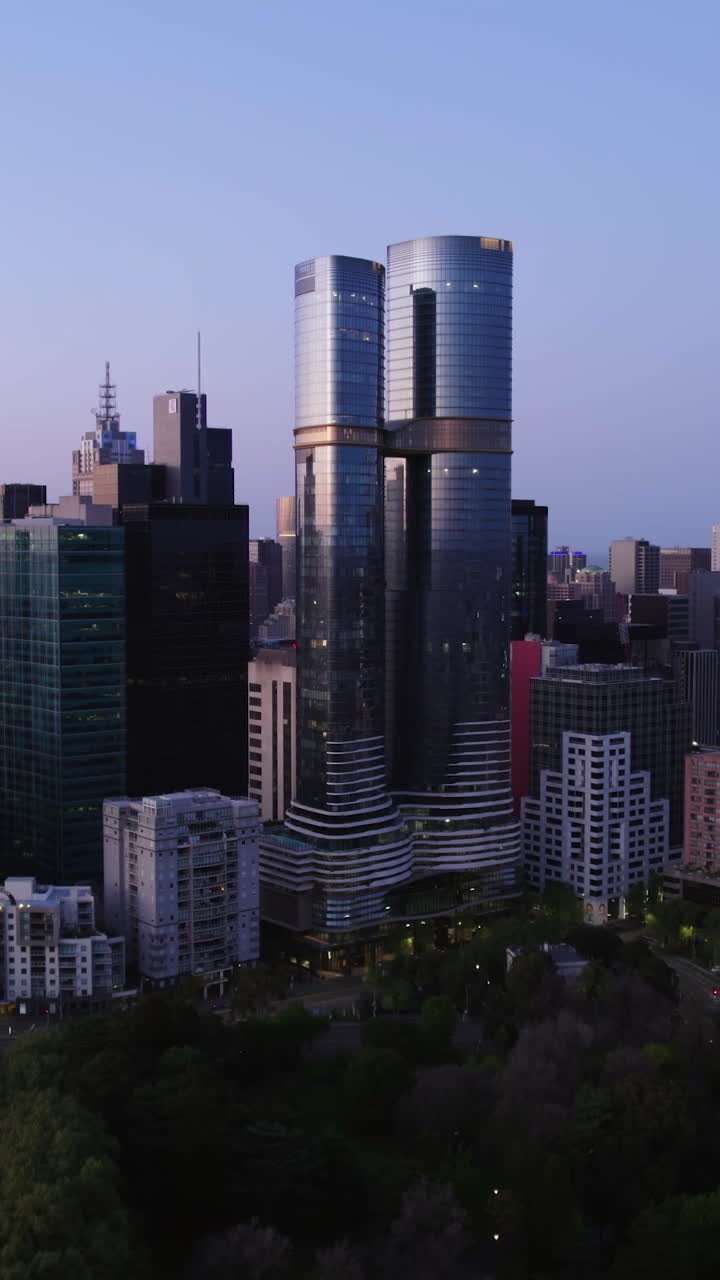 Portrait drone shot of the Melbourne skyline, colorful evening in Australia