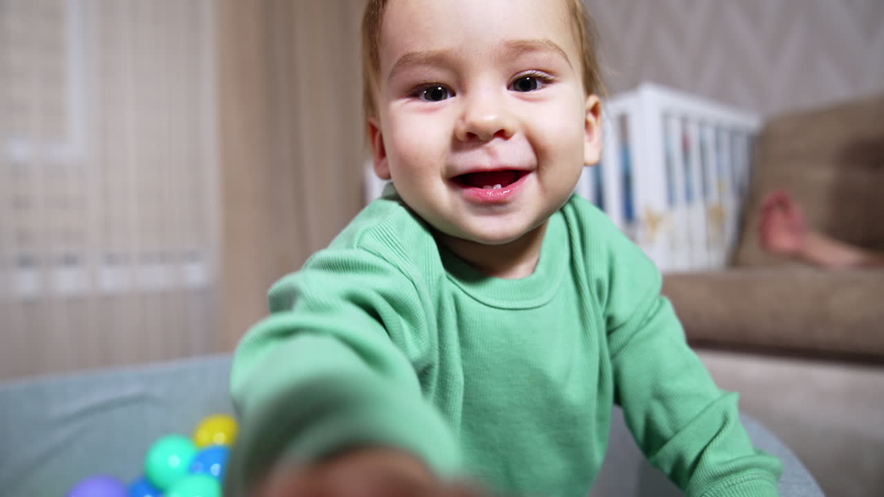 Baby Playing in a Ball Pit