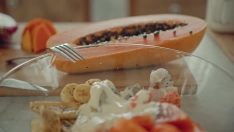 fresh fruit salad with papaya and other tropical fruits