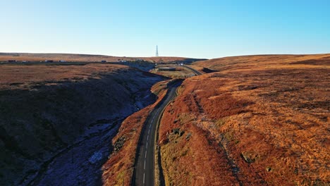 moving aerial moorland view of saddleworth moor, the m62 motorway and ripponden road