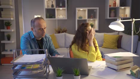 married couple fight over debts and high bills.