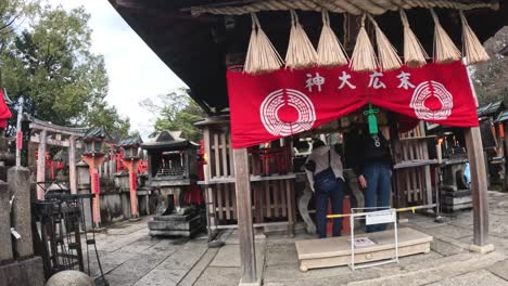 people participating in a ritual at a shrine