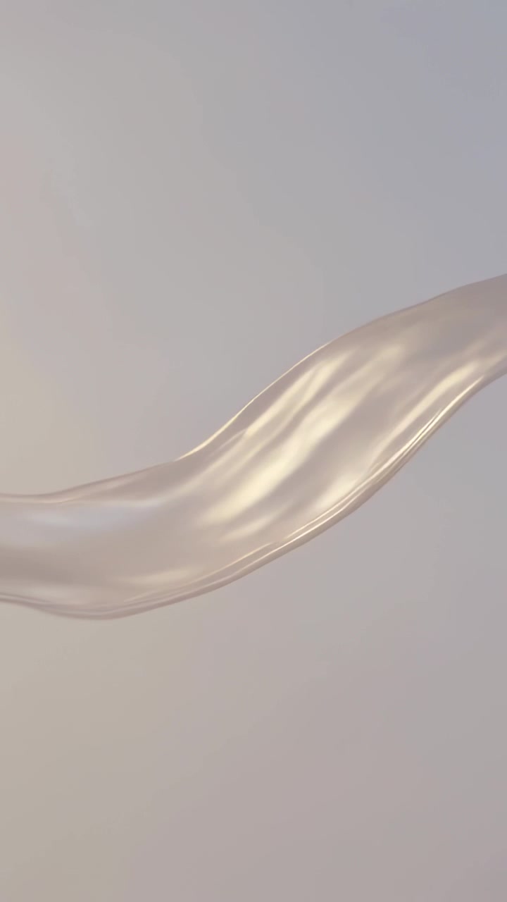 Vertical video: Gliding silk ribbon entering right, sweeping left across gradient, to reveal sheen