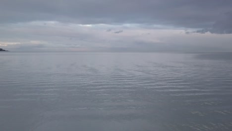 Reveal-shot-of-the-lake-and-trees