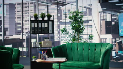 vertical video business lobby featuring sofa in a bright modern boardroom with glass elements