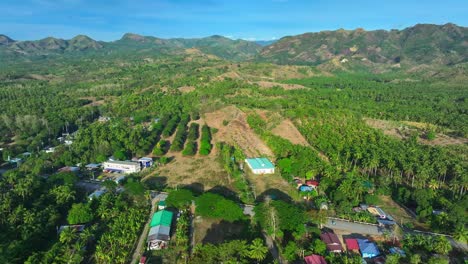 Green-Mountains-with-path-on-peak-on-Mindanao-Island,-Philippines-in-summer