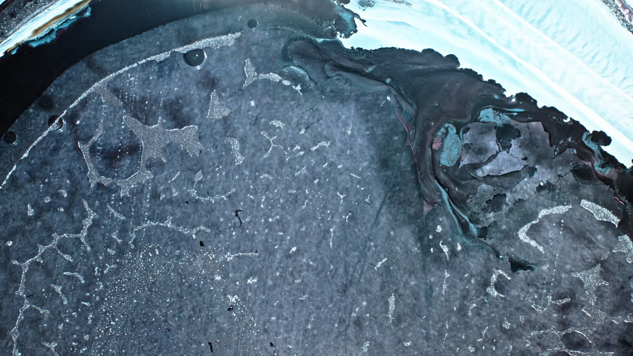 Macro view of substances mixing, creating dynamic abstract patterns