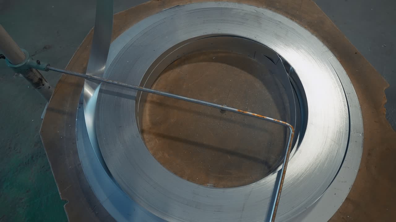 desenroscamiento de bobinas de tiras metálicas