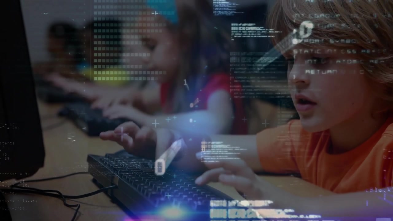 Boy reaching for mouse and typing triggers animated code intensifying coding exercise for education