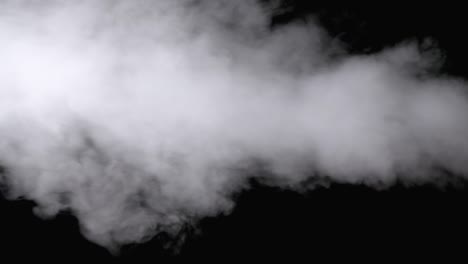 white water vapor. jet of vapour steam on black background. slow motion