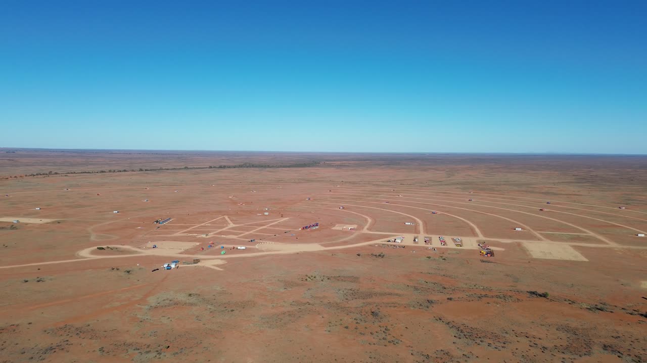 The crowds are gone, the music has faded, and only the desert remains. Fly over the silent, empty plains where the Mundi Mundi Bash once roared to life