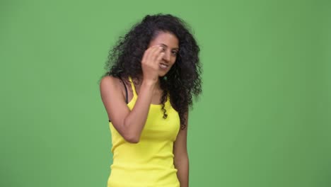 young stressed hispanic woman not wanting to see something