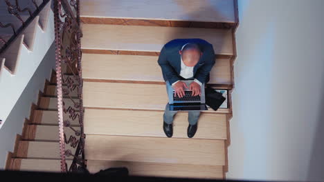 top view of businessman working on business deadline