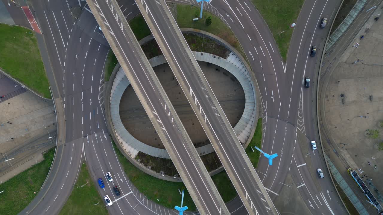 highway roundabout passing over halle saale germany on a cloudy summer day. vertical bird's eye view drone