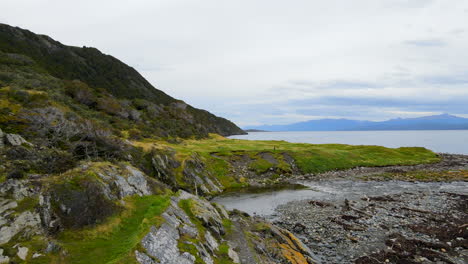 Drone-video-of-rocky-coast-in-Ushuaia-Patagonia-Argentina,-next-to-the-Beagle-Channel