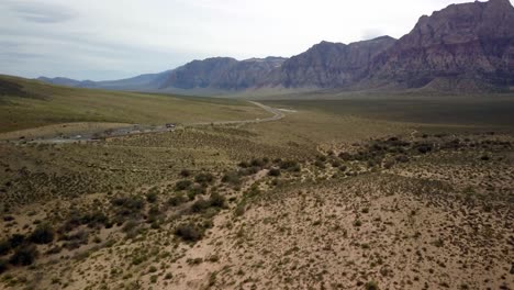 Aerial-tilt-up-to-reveal-mountains-at-Red-Rock-Canyon-in-Nevada