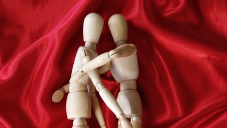 figurine couple embracing each other