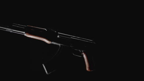machineguns on the dark background rotate in slowmotion