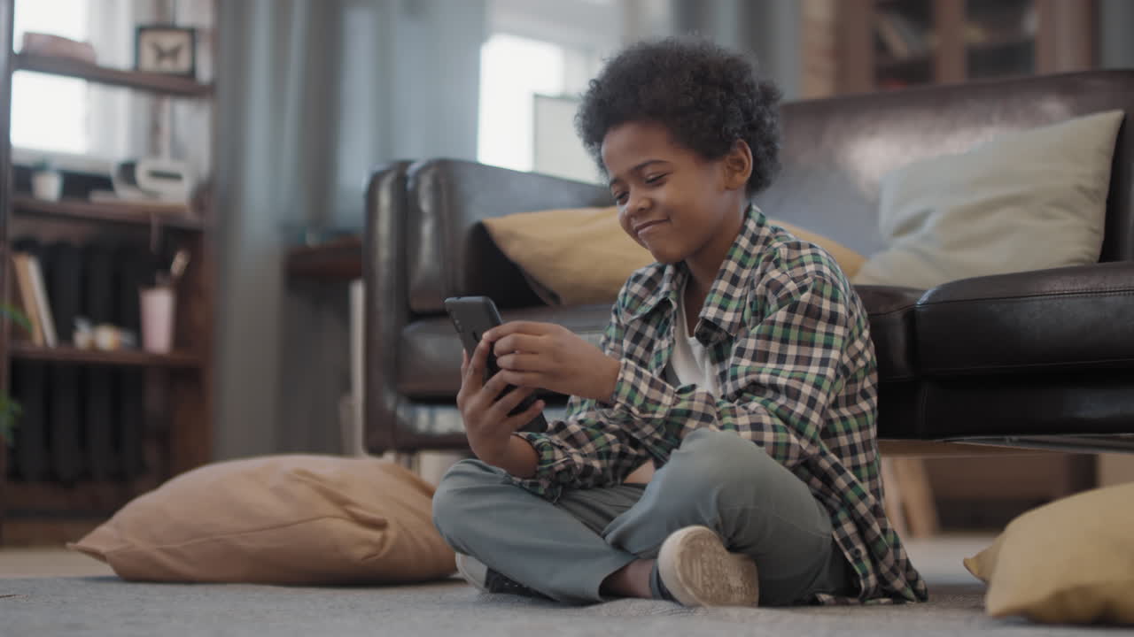 Joyful Afro Boy Having Video Call