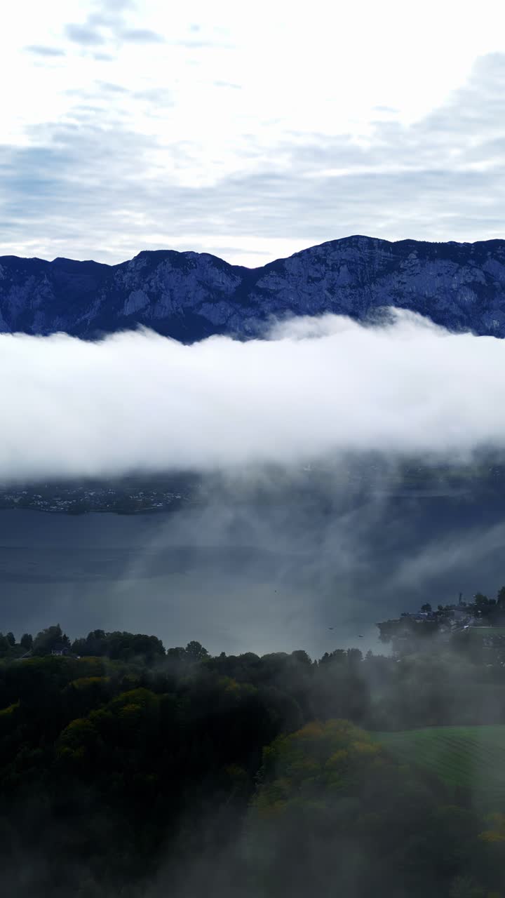 Serene mountain view with clouds drifting, calm and peaceful nature scene