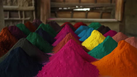 vibrant piles of colorful powders and pigments