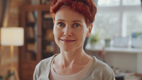 portrait of happy redhead woman