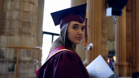 proud graduate at ceremony