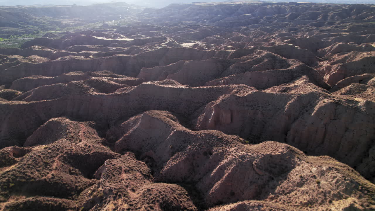 Flying over the mountainous desert of Gorafe, Granada, Spain