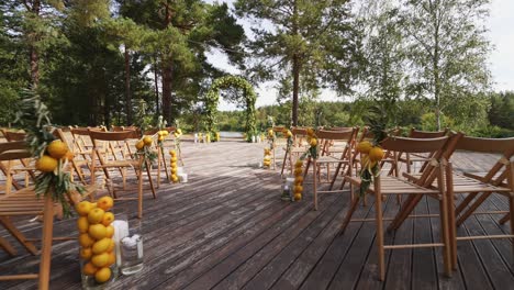 outdoor wedding ceremony with lemon decor