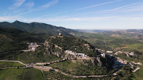 aerial drone pushes in towards the zahara de la sierra castle.