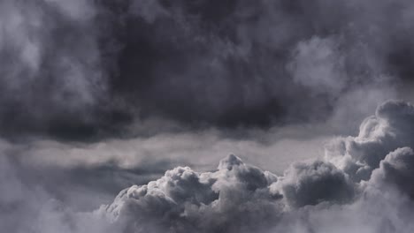 a collection of thick gray clouds moved across the sky