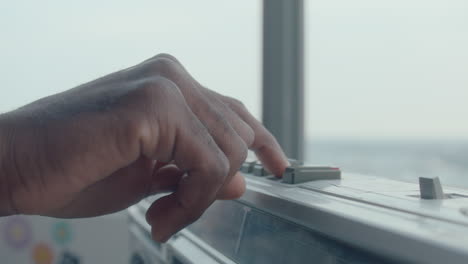 close up of using cassette tape player