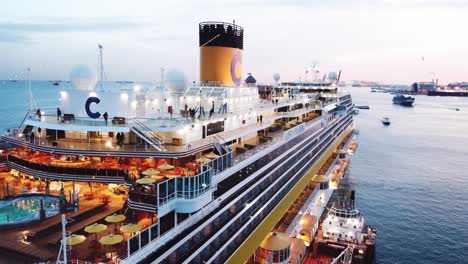 cruise ship in port at sunset