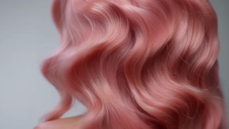 close-up of pink wavy hair
