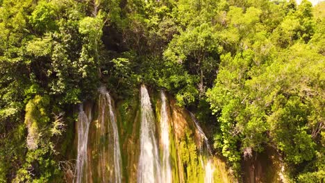 descending close up drone view of limon waterfall, dominican republic