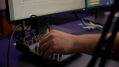Close-up of streamer checking sound
