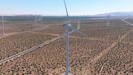 Wind-turbine-farm-generating-sustainable-energy-in-the-Mojave-Desert---aerial