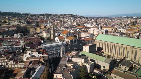 Aerial-Establishing-Shot-of-Basilica-Church-of-Gesu-Nuovo-in-Naples,-Italy