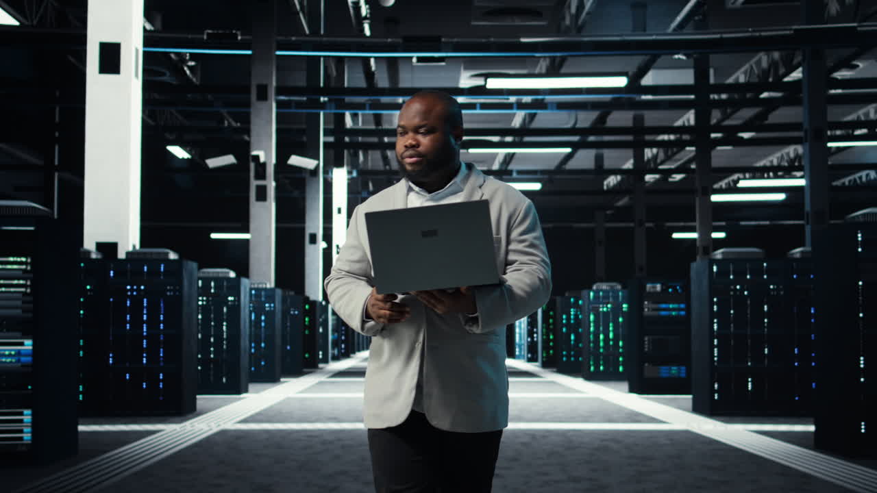 Vertical video Programmer in data center using laptop, testing equipment failover scenarios