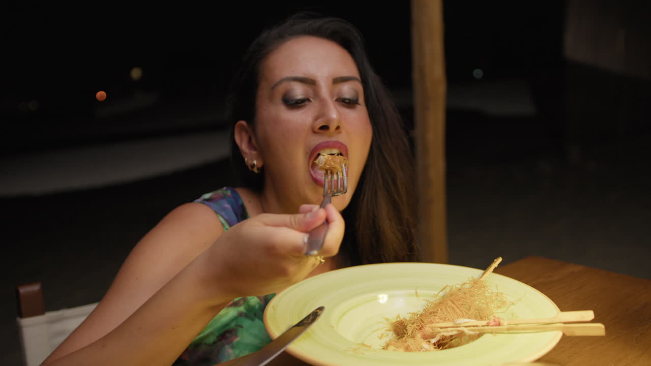 Woman At The Restaurant On The Beach Having Gourmet Dinner