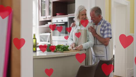 animación de los iconos de corazones que caen sobre la pareja mayor