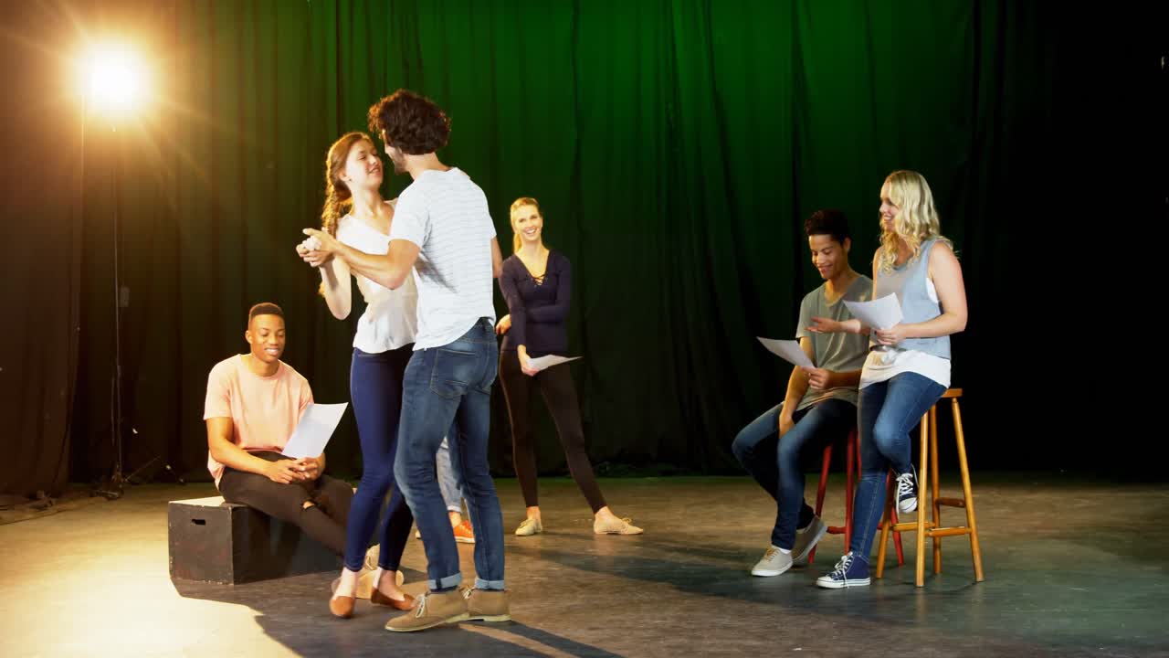 Actors practicing play on stage 4k