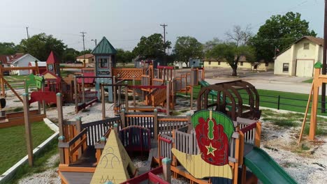 aerial view truck right to left of a playground in ponder texas