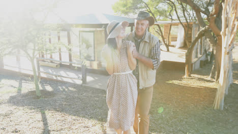 couple walking on wooden boardwalk 4k