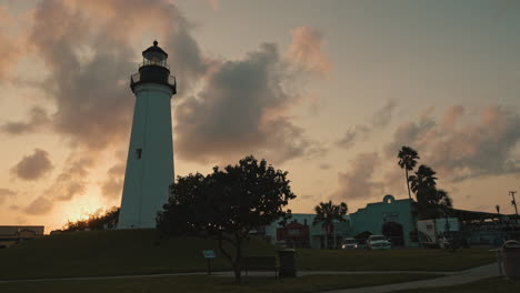 lighthouse at sunset in 4k in south texas on the coast in port isabel gulf of mexico orange skies setting sun state historic site