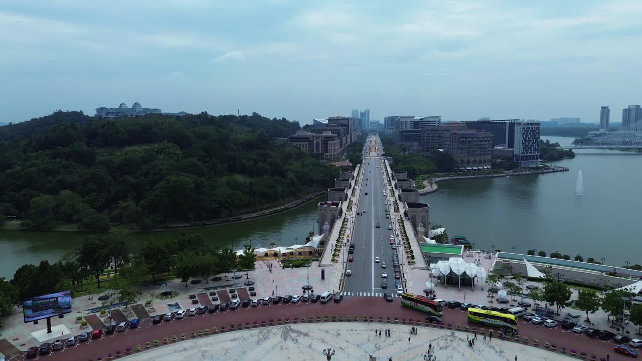 Aerial view Putrajaya City Centre and lake in Malaysia drone video above main road