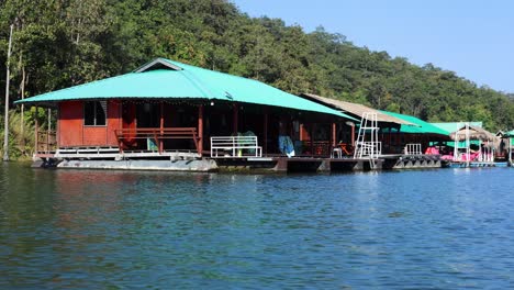 scenic view of floating structures on a calm lake